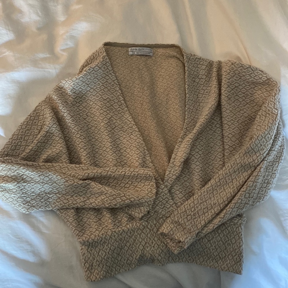 Cropped beige urban outfitters sweater. Size medium. Worn a handful of times.